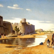 Arabská karavana před opevněným městem