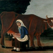 Žena dojící krávu