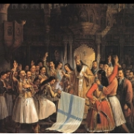 Biskup Germanos žehná praporu revoluce